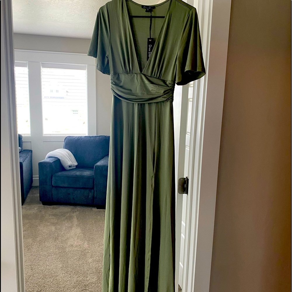 Beautiful sage green dress brand new, never worn. 59” from shoulder to hem. Sz 4